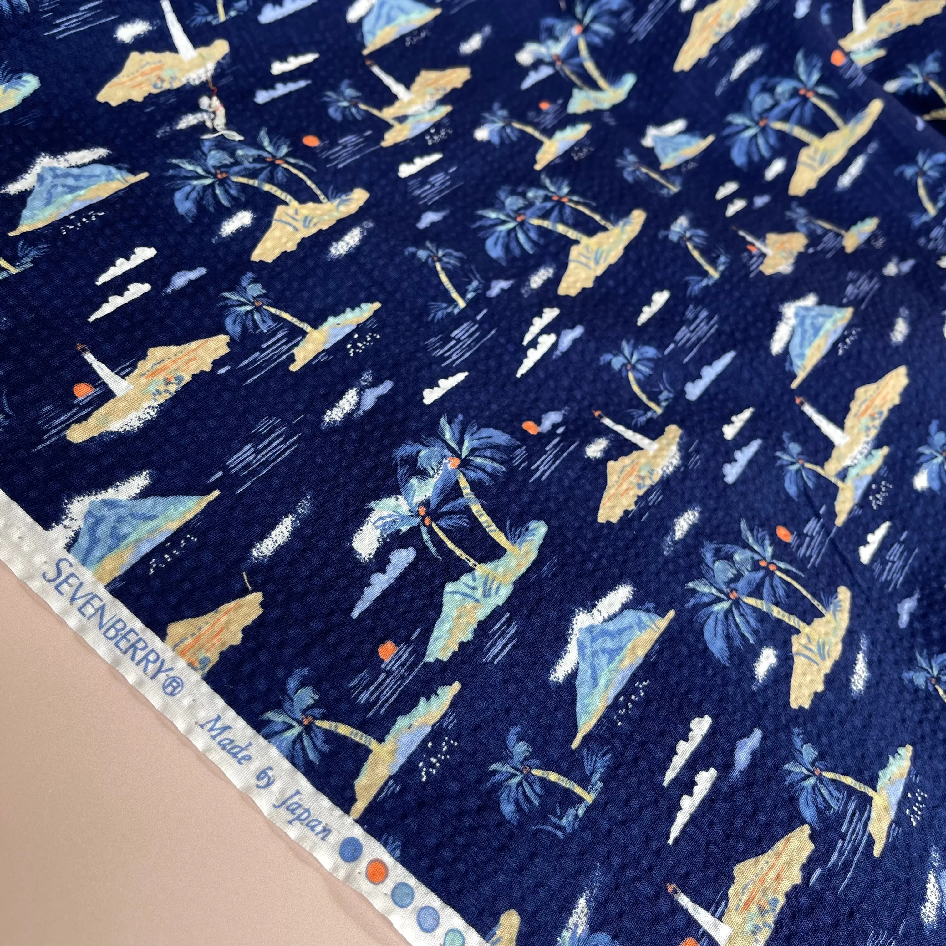 REMNANT 1.23 Metres - Holiday Islands on Navy Cotton Seersucker Fabric